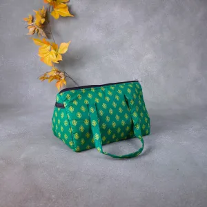 Barrel Handbags Green Colour with Small Yellow Prints.